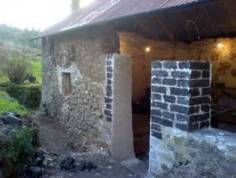 doorway in cob and stone barn formed by cob blocks